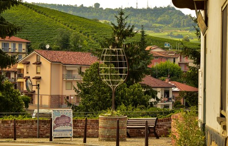 Barolo, Piedmont, Italy. July 2018. A futuristic steel construction represents a great glass. It is...