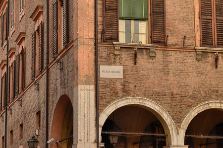 Modena, Emilia Romagna, Italy. December 2018. Piazza Maggiore is the historic center of the city. The clock tower, together with the cathedral is one of the characteristic elements of the square.のeditorial素材