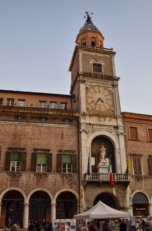 Modena, Emilia Romagna, Italy. December 2018. Piazza Maggiore is the historic center of the city. The clock tower, together with the cathedral is one of the characteristic elements of the square.のeditorial素材