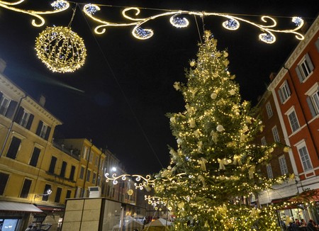 Modena, Emilia Romagna, Italy. December 2018. Night photography in Piazza XX Settembre. The large Christmas tree, with its pleasant lighting, stands out in the square.のeditorial素材