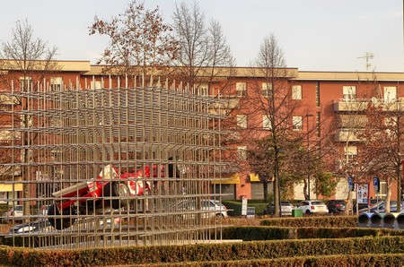 Maranello, Italy, December 2018. Entry of the Ferrari museum, a Formula One single-seater is displayed caged inside a modern metal structure.のeditorial素材