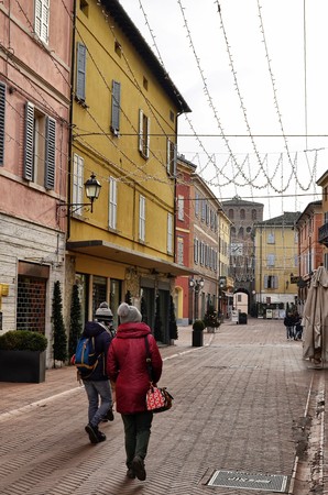 Vignola, Emilia Romagna, Italy. January 2019. North of the fortress, view of via Giuseppe Garibaldi, in the background the tower with the clock stands out.のeditorial素材