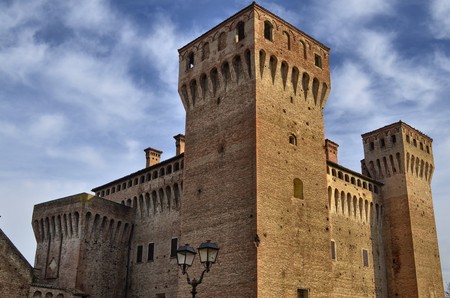 Vignola, Emilia Romagna, Italy. January 2019. The fortress of Vigonola seen from the south, overlooking the bank of the river Panaro. The cars, along the bridge over the river, can admire it.のeditorial素材