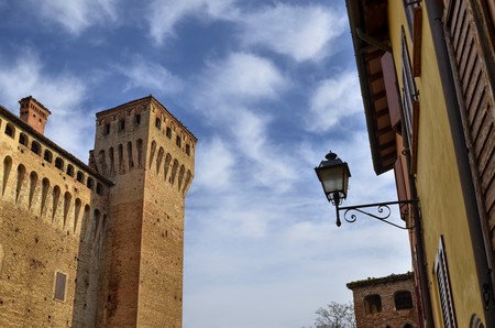 Vignola, Emilia Romagna, Italy. January 2019. The fortress of Vigonola seen from the south, overlooking the bank of the river Panaro. The cars, along the bridge over the river, can admire it.のeditorial素材