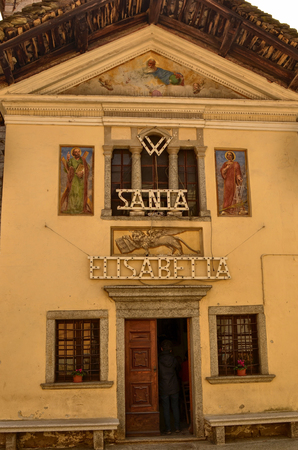 Mergozzo, Piedmont, Italy. March 2019. On the hill near the lake the village is one of the most beautiful villages in Italy. The facade of the church of St. Elizabethのeditorial素材