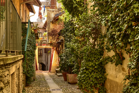 Mergozzo, Piedmont, Italy. March 2019. On the hill near the lake the village is one of the most beautiful villages in Italy. Intimate glimpses of narrow lanes occasionally reveal the lake.のeditorial素材