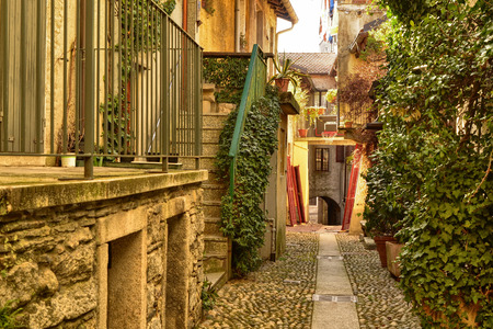 Mergozzo, Piedmont, Italy. March 2019. On the hill near the lake the village is one of the most beautiful villages in Italy. Intimate glimpses of narrow lanes occasionally reveal the lake.のeditorial素材