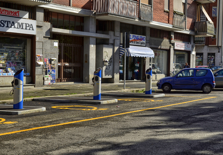 Turin, Italy, Piedmont June 08 2018. Electric car rental, parking with fast charging points.のeditorial素材