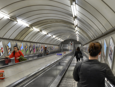 London, United Kingdom, June 2018. The London Underground escalators, transport passengers from subway depth to the surface and vice versa. Vision in perspective.のeditorial素材