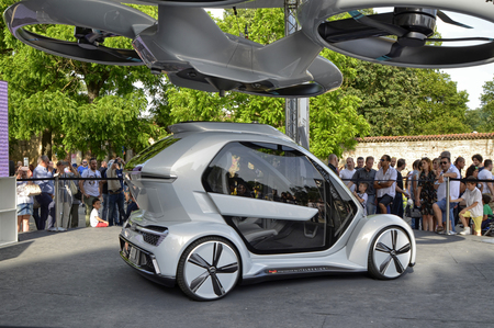 Turin, Piemonte, Italy. June 2018. Fully electric modular system resulting from the collaboration between Audi Airbus and Italdesign. Land and air vehicle on display at the auto show.のeditorial素材