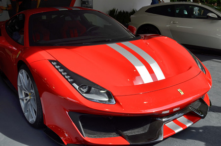 Turin, Piedmont, Italy. June 2018. At the Valentino park, the motor show. At the Ferrari stand, three-quarters of a typical red race car that characterizes the brand.のeditorial素材