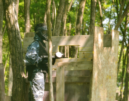 Paintball battle. The battlefield is equipped with turrets: they allow players to shoot their opponents from a privileged point of view while remaining protected.の写真素材
