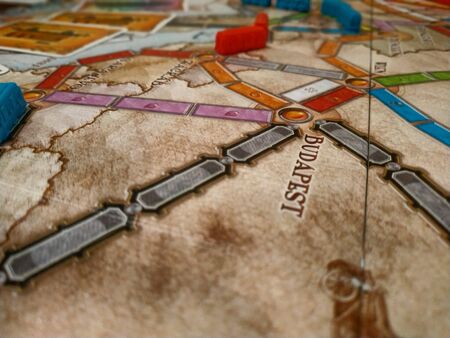 Turin, Piemonte, Italy. June 2019. A game at the board game Ticket to Ride: with a railway setting,...