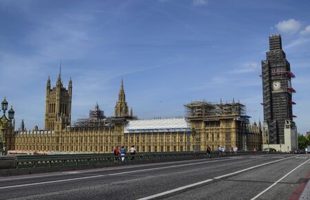 London, United Kingdom, June 2018. Viewpoint from the Westminster Bridge towards the Houses of Parliament and Big Ben. Conservation in perfect condition periodically requires scaffolding.のeditorial素材