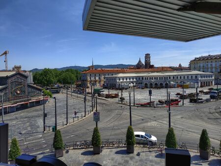 Turin, Piedmont, Italy. June 2019. From the terrace of the new central market you can enjoy a beautiful view of Piazza della Repubblica. This is where the largest European outdoor market is held.のeditorial素材