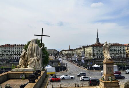 Turin, Piedmont, Italy. June 2019. Filmed towards Piazza Vittorio from the Gran Madre church. Note the statues facing the square, the flow of traffic on the bridge that crosses the river Po.のeditorial素材