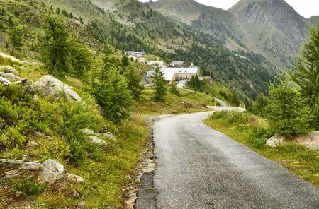 S. Anna di Vinadio, Piedmont, Italy. July 2019. View from above of the township. Visible the parking area for campers of the faithful who come on pilgrimage by their own means.の写真素材
