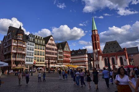 Frankfurt am Main, Germany, August 2019. The RÃ¶merberg is the historic square with charming historic buildings and the church. Crowded with tourists.のeditorial素材