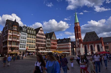 Frankfurt am Main, Germany, August 2019. The RÃ¶merberg is the historic square with charming historic buildings and the church. Crowded with tourists.のeditorial素材