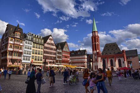 Frankfurt am Main, Germany, August 2019. The RÃ¶merberg is the historic square with charming historic buildings and the church. Crowded with tourists.のeditorial素材