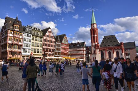 Frankfurt am Main, Germany, August 2019. The RÃ¶merberg is the historic square with charming historic buildings and the church. Crowded with tourists.のeditorial素材