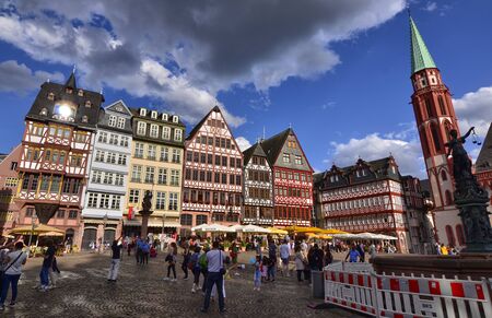 Frankfurt am Main, Germany, August 2019. The RÃ¶merberg is the historic square with charming historic buildings and the church. Crowded with tourists.のeditorial素材