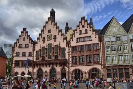 Photo for Frankfurt am Main, Germany, August 2019. The Römer is the historic city hall of the city. From the very characteristic façade it is one of the attractions for tourists who flock to the square. - Royalty Free Image