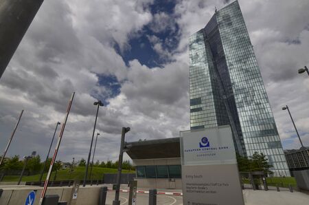 Frankfurt am Main, Germany, August 2019. The new headquarters of the ECB is a skyscraper with a very modern design: steel glass gives a mirrored facade that reflects the sky and the surrounding cloudsのeditorial素材