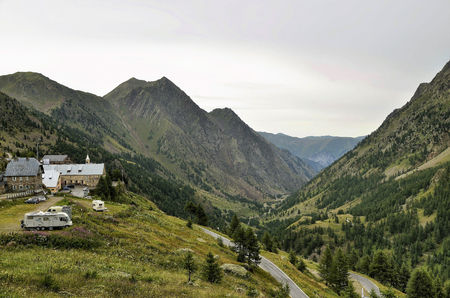 S. Anna di Vinadio, Piedmont, Italy. July 2019. View from above of the township. Visible the parking area for campers of the faithful who come on pilgrimage by their own means.のeditorial素材