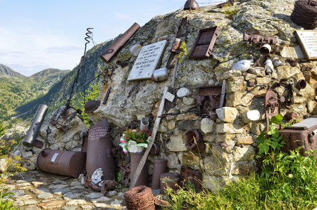 Vinadio, Piedmont, Italy.July 2019. A memorial dedicated to those killed in the Second World War, made with objects from the time. In evidence rusty barbed wire and parts of bombs explodedのeditorial素材