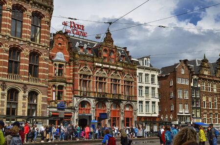 Amsterdam, Holland. August 2019. Behind Piazza Dam, Il Magna Plaza: the luxury shopping center in the historic center. The beauty of the red brick building strikes tourists.のeditorial素材