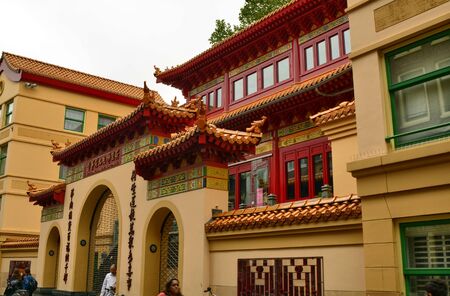 Amsterdam, Holland, August 2019. Amsterdam's cinatown is immediately recognizable by its ideograms and unmistakable architecture. The temple with its warm and bright colors.のeditorial素材