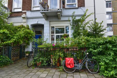 Amsterdam, Holland, August 2019. Along the river Amstel, on the outskirts of the city it is easy to meet house doors with a strong appeal to the London style.のeditorial素材