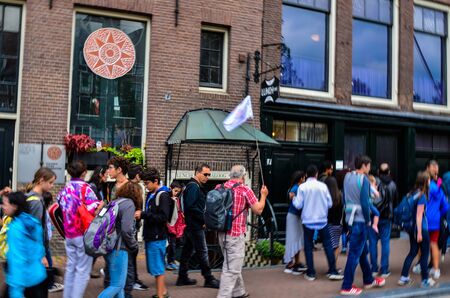 Amsterdam, Holland, August 2019. Anne Frank's house is a destination for many tourists: the crowd in the street is remarkable.のeditorial素材