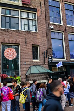 Amsterdam, Holland, August 2019. Anne Frank's house is a destination for many tourists: the crowd in the street is remarkable.のeditorial素材