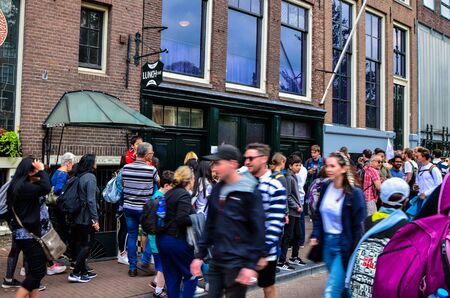 Amsterdam, Holland, August 2019. Anne Frank's house is a destination for many tourists: the crowd in the street is remarkable.のeditorial素材