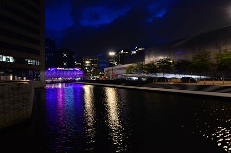 Amsterdam, Netherlands, August 2019. Night view of the modern suburbs. Modern buildings face the canals.のeditorial素材