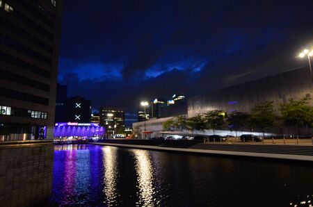 Amsterdam, Netherlands, August 2019. Night view of the modern suburbs. Modern buildings face the canals.のeditorial素材