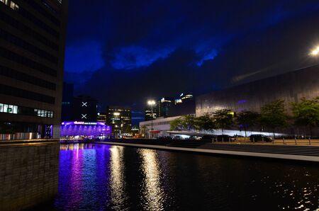 Amsterdam, Netherlands, August 2019. Night view of the modern suburbs. Modern buildings face the canals.のeditorial素材