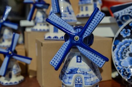 Delft, the netherlands, august 2019. At a shop of the famous white and blue ceramics of miniature...