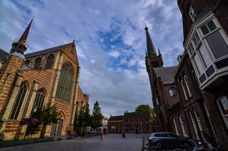 Goes, the netherlands, August 2019. The square where we find the two large churches: Kerk Singelstraat Maria Magdalena and Saint Maria Magdalena. With their grandeur they dominate the scene.のeditorial素材