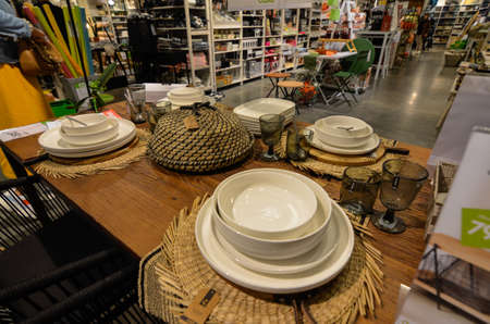 Ghent, Belgium, August 2019. At a shopping center, a table set complete with accessories.のeditorial素材