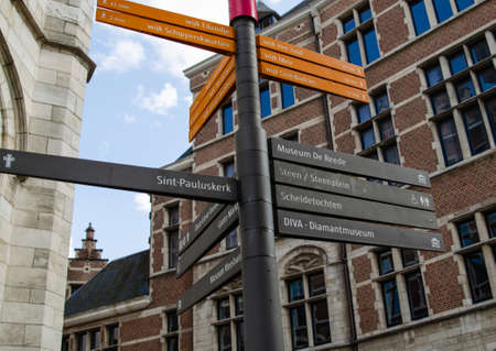 Antwerp, Flanders, Belgium. August 2019. Indicator signs of the main points of tourist interest: museums, squares and churches.のeditorial素材