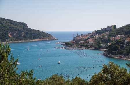Portovenere, Liguria, Italy. June 2020. Sea view from the village hill: a magnificent view of the bay crossed by numerous boats of various sizes.の写真素材