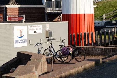 Netherlands, weastkapelle. August 2019. Near the lighthouse there is a free charging point for electric bikes.のeditorial素材