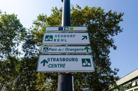 Strasbourg, France. August 2019. Tourist information signs for the historic center and park Orangerie.  Beautiful summer day.のeditorial素材