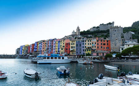 Porto Venere, Liguria, Italy. June 2020. Enchanting urban landscape of the colorful houses of the old town overlooking the harbor. Beautiful summer day.のeditorial素材