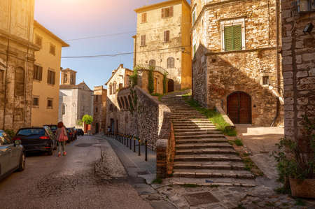 Perugia, Umbria, Italy. August 2021. A charming alley winds its way between the houses of the historic center.の写真素材