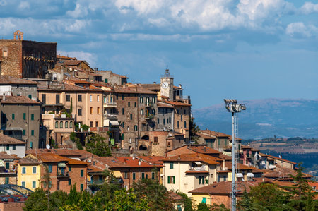 Chianciano Terme, Tuscany, Italy. August 2020. View of the historic village, recognizable the clock tower. Beautiful summer day.の写真素材