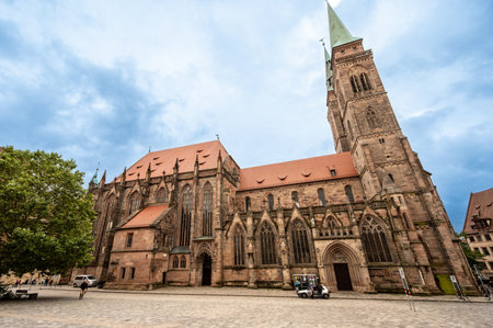 Nuremberg, Germany, August 1, 2023. In the old town, the great church of St. Sebaldus. Rainy day, travel destinations.の写真素材